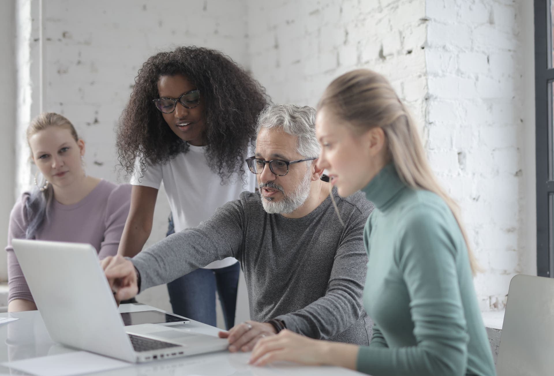 Team members working together in an office